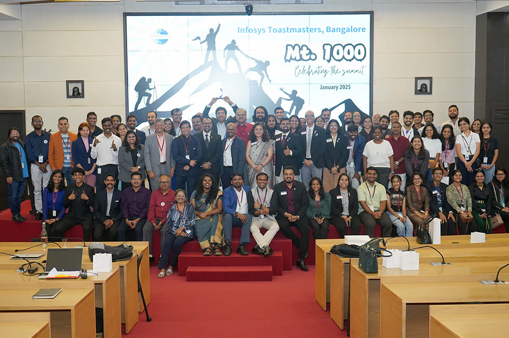 Current and past members and leaders of Infosys Toastmasters, Bangalore club, in Karnataka, India, celebrate the club’s 1000th meeting with inspirational speeches, contests, and high tea and food. The event was held over two days in order to celebrate with both in-person attendees and remote members.