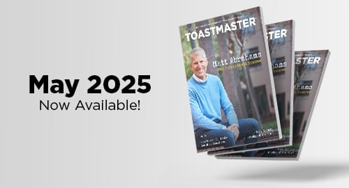 The image shows the cover of the Toastmaster magazine, featuring a man in a blue shirt sitting on a chair, with the text "May 2025 Now Available!" prominently displayed.