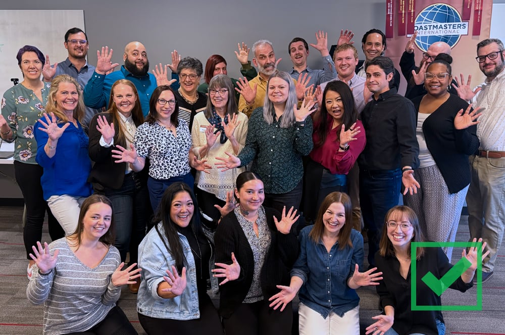 large group of people with jazz hands