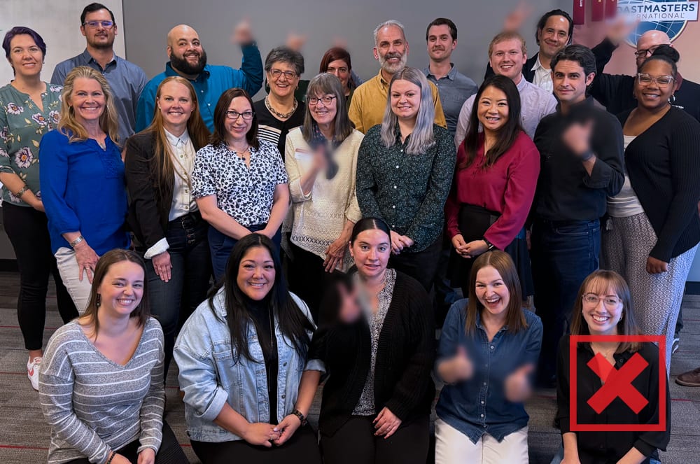 larger group using blurred out hand gestures that may have meanings in other cultures.