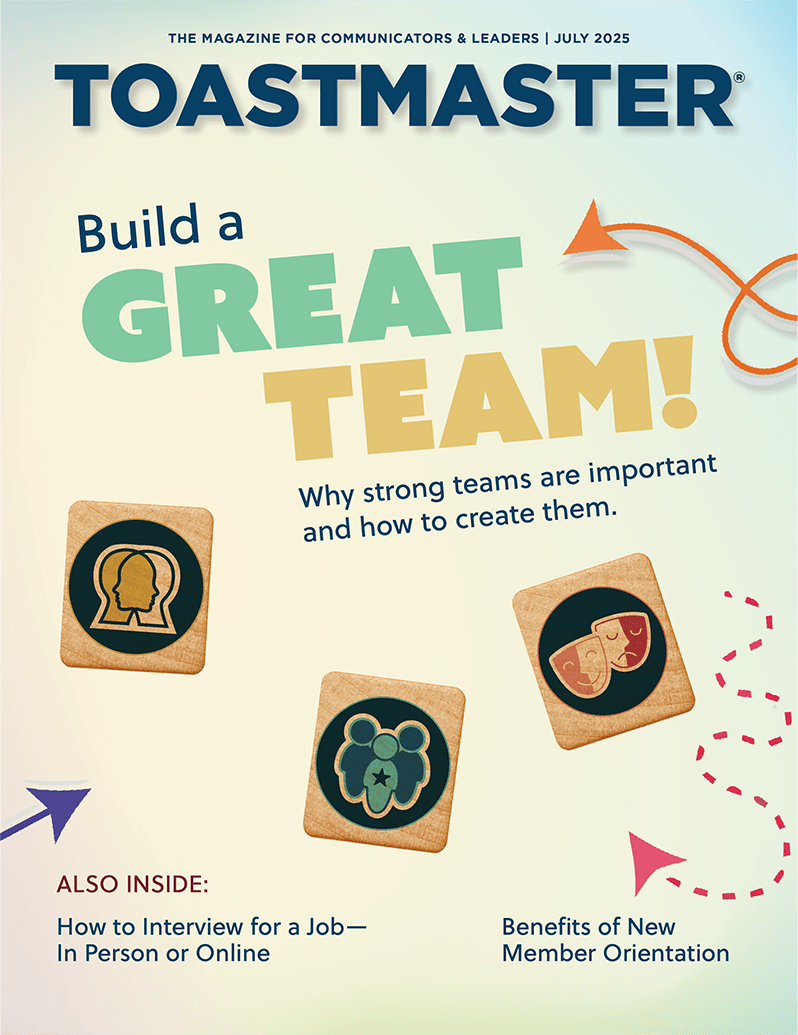 The cover of the Toastmaster magazine features illustrations of various icons representing the theme of "Build a Great Team!" against a colorful background.