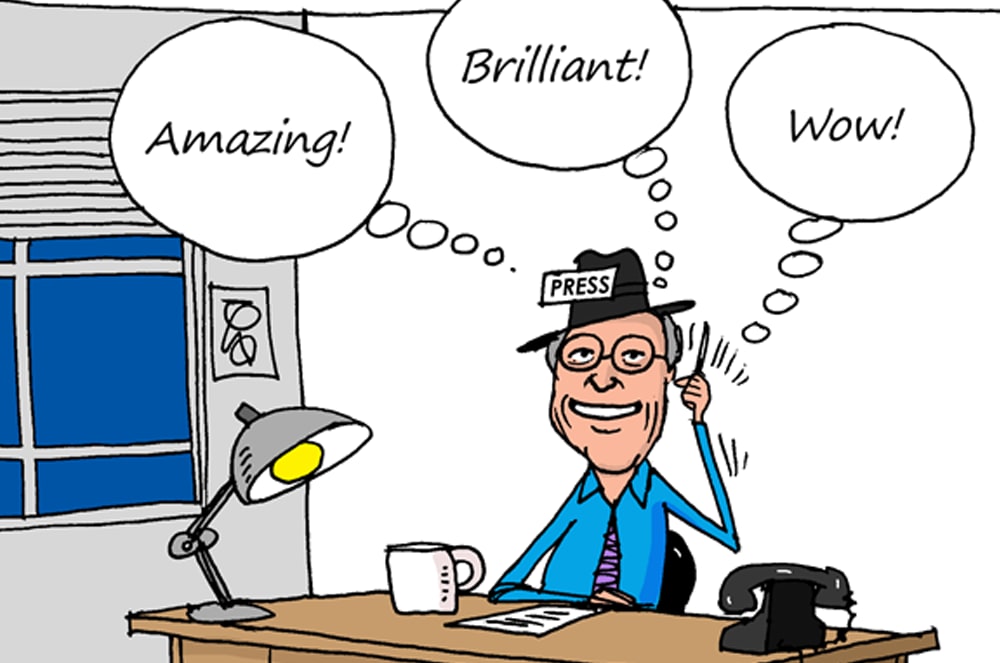 An illustration of Paul Sterman thinking at a desk with thought bubbles above him with the words “Amazing!” “Brilliant!” and “Wow!”