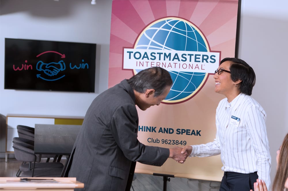 Two people shaking hands