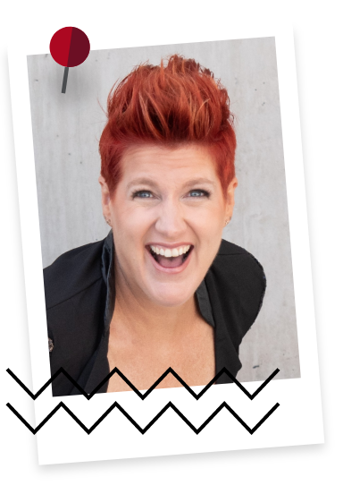 Headshot of woman with short red hair smiling
                                