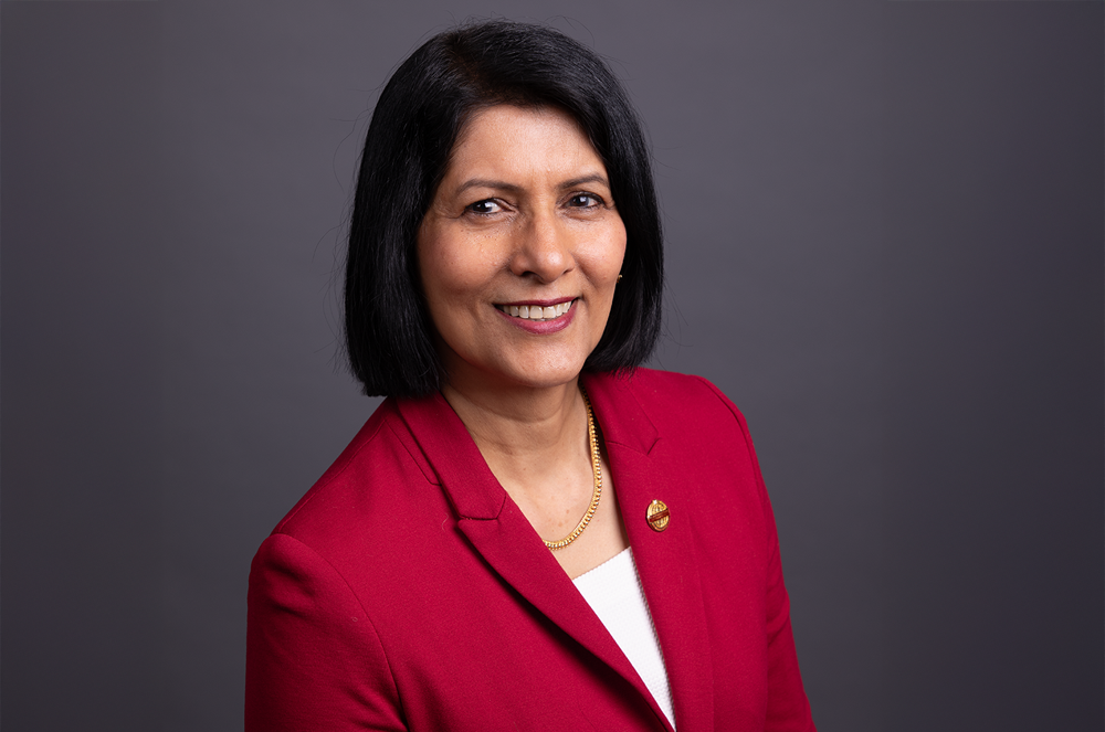 Portrait of woman in red jacket smiling