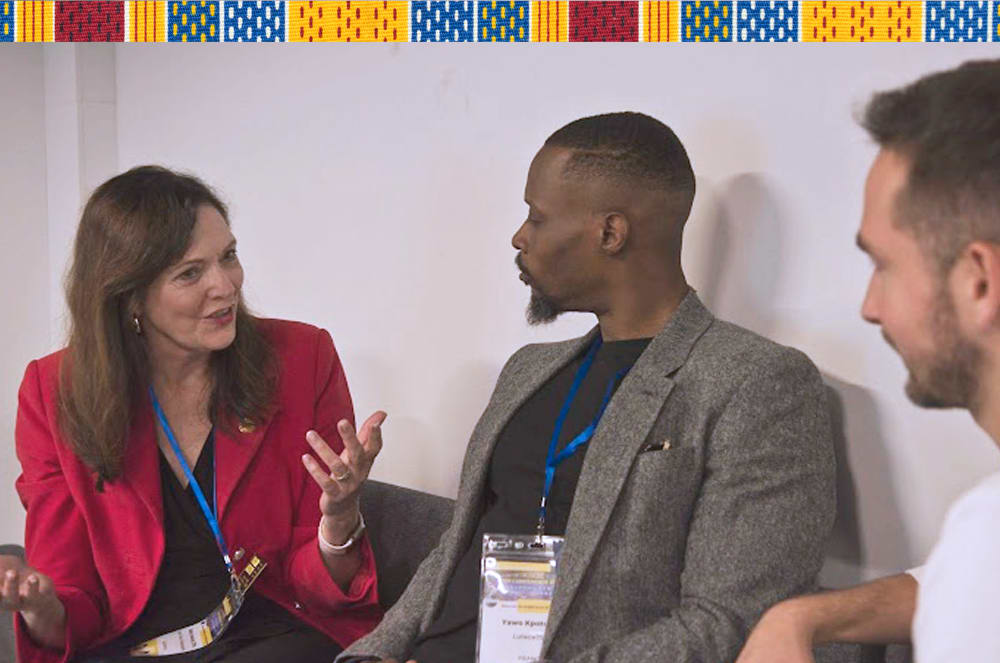Rochat talks to a member of District 59 in Eindhoven, the Netherlands.
