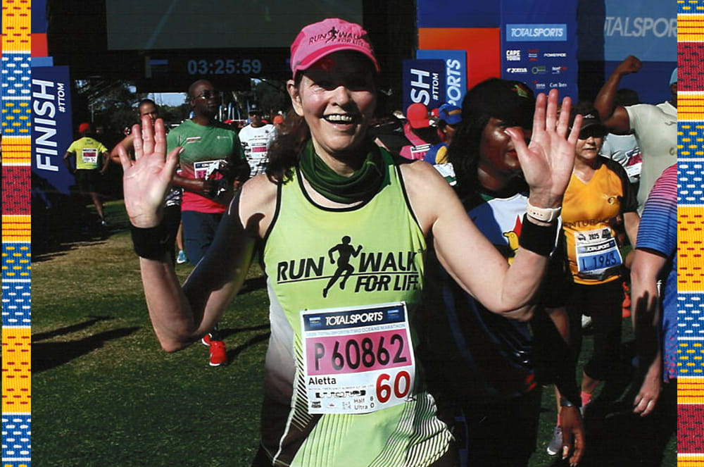 Rochat, an avid runner, shown completing the Two Oceans Half Marathon in Cape Town, South Africa, in 2025.