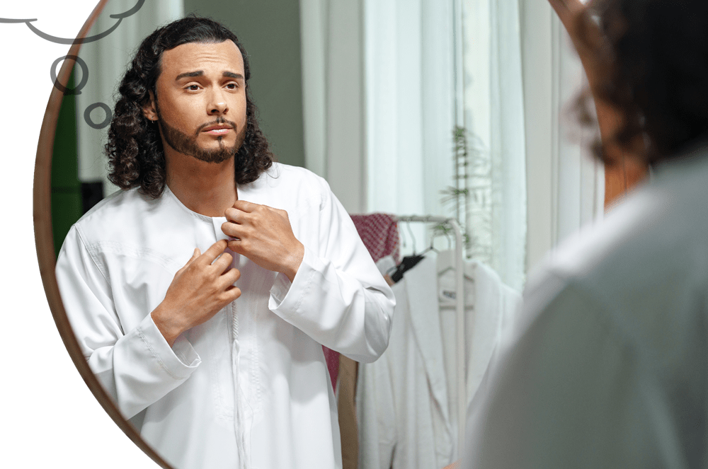 A man looking at himself in a mirror