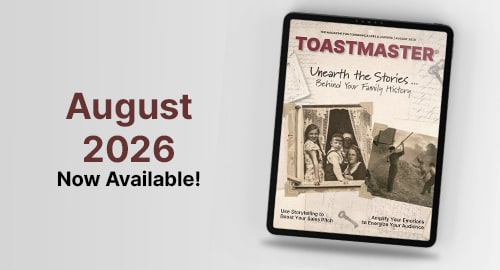 A tablet displaying the August 2026 Toastmaster magazine cover with the headline "Leadership in the Age of AI" is on the right, while "July 2026 Now Available!" is displayed in large text on the left against a plain background.