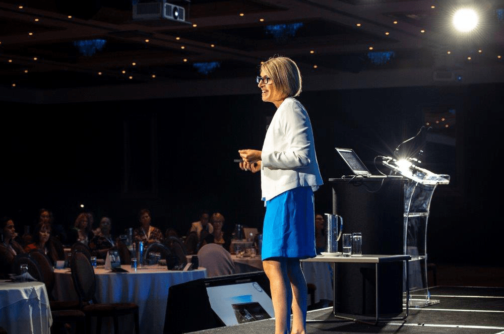 Lauren Parsons, DTM, AS, speaks at the 2020 Corporate Health and Wellbeing Summit.